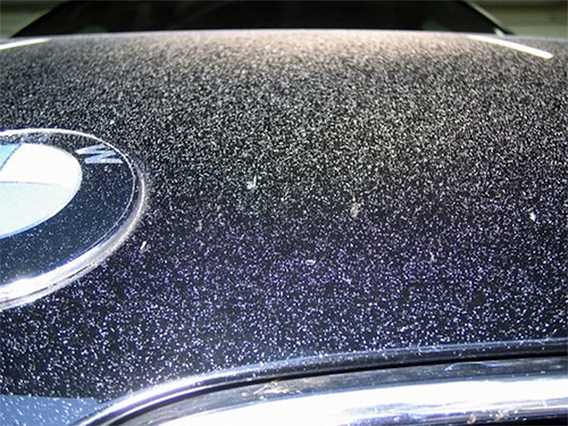 How do I get paint overspray off my windshield?