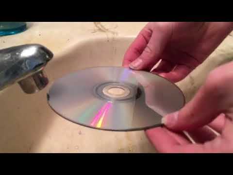 How do you clean a Wii disc slot?