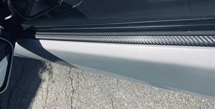 How do you clean the rubber trim on a car window?